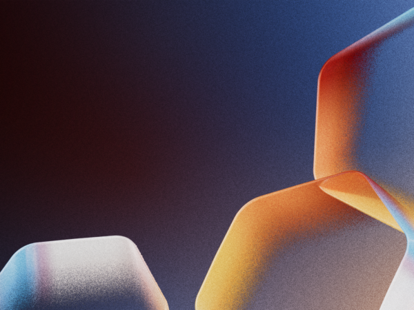 Hexagonal shapes of different colors against a dark background.